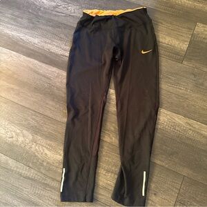 Nike Black Leggings with Gold Swoosh